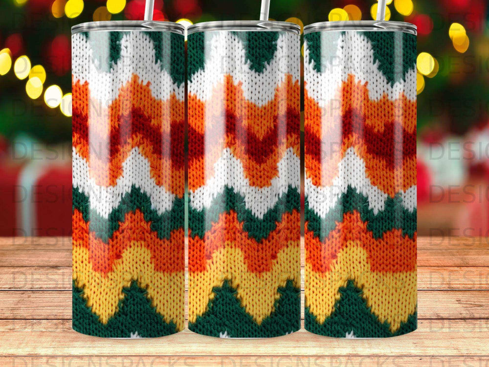 Zigzag pattern tumbler with green, orange, yellow, and white chevron design.