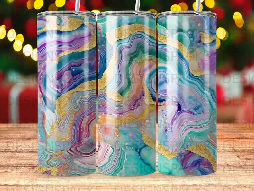 Tumbler with marbled abstract pattern and gold accents.