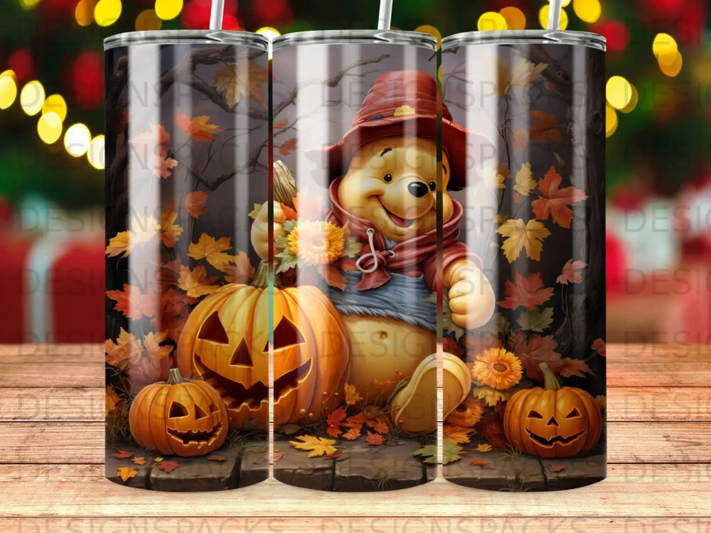 Winnie the Pooh with pumpkins and fall leaves.