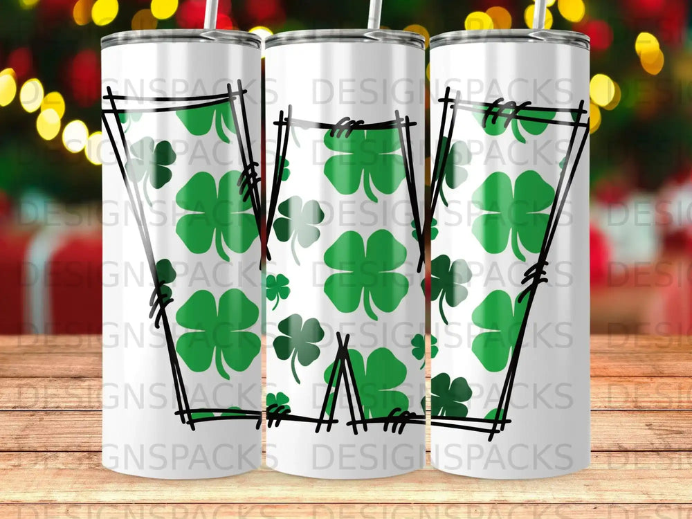 Green shamrocks and white stripes on three tumblers.