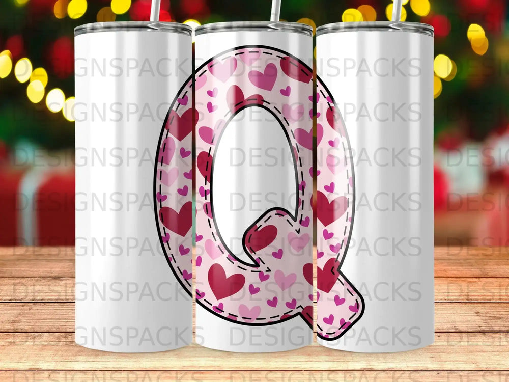 Pink glitter tumbler with a large, pink heart pattern and "G N S P A C K S" text.
