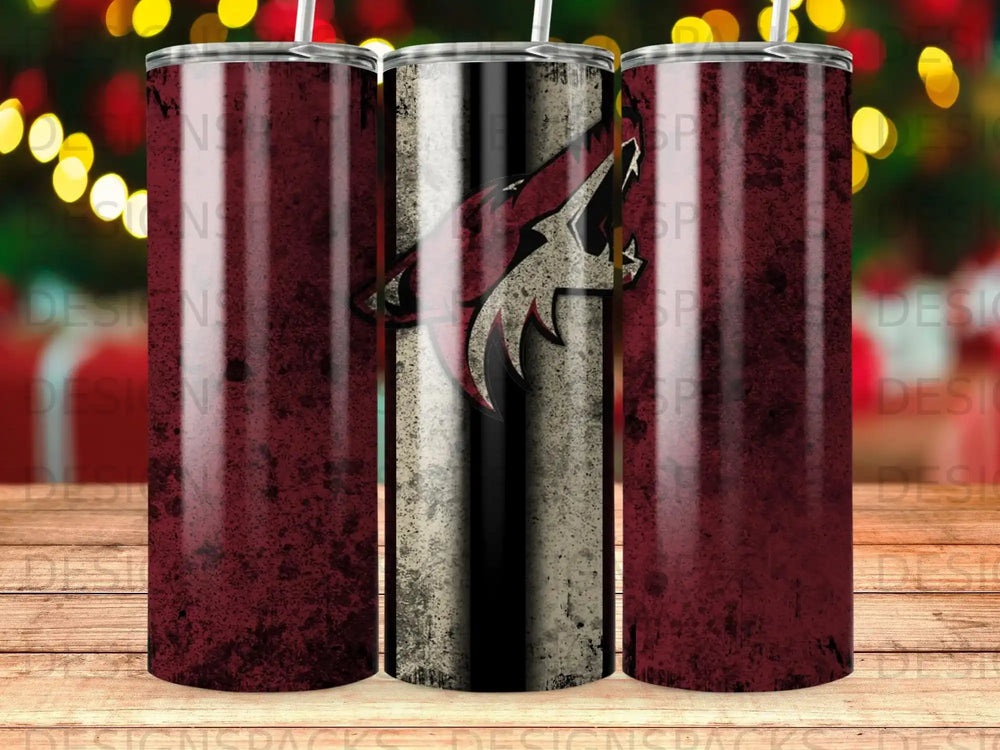 Three tumblers with distressed red and black designs, one featuring a coyote logo.