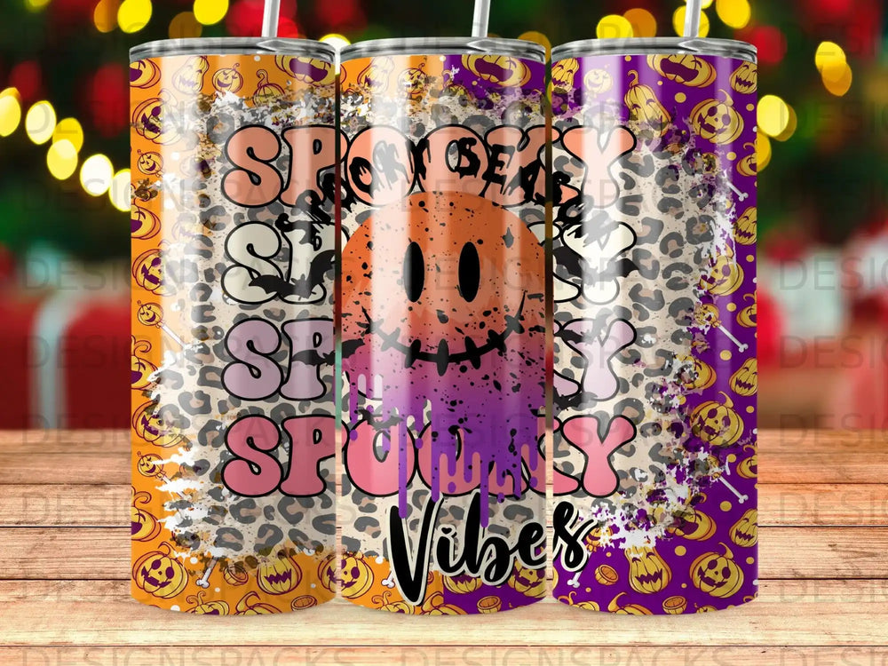 Spooky Vibes tumbler with pumpkins, ghosts, and leopard print.