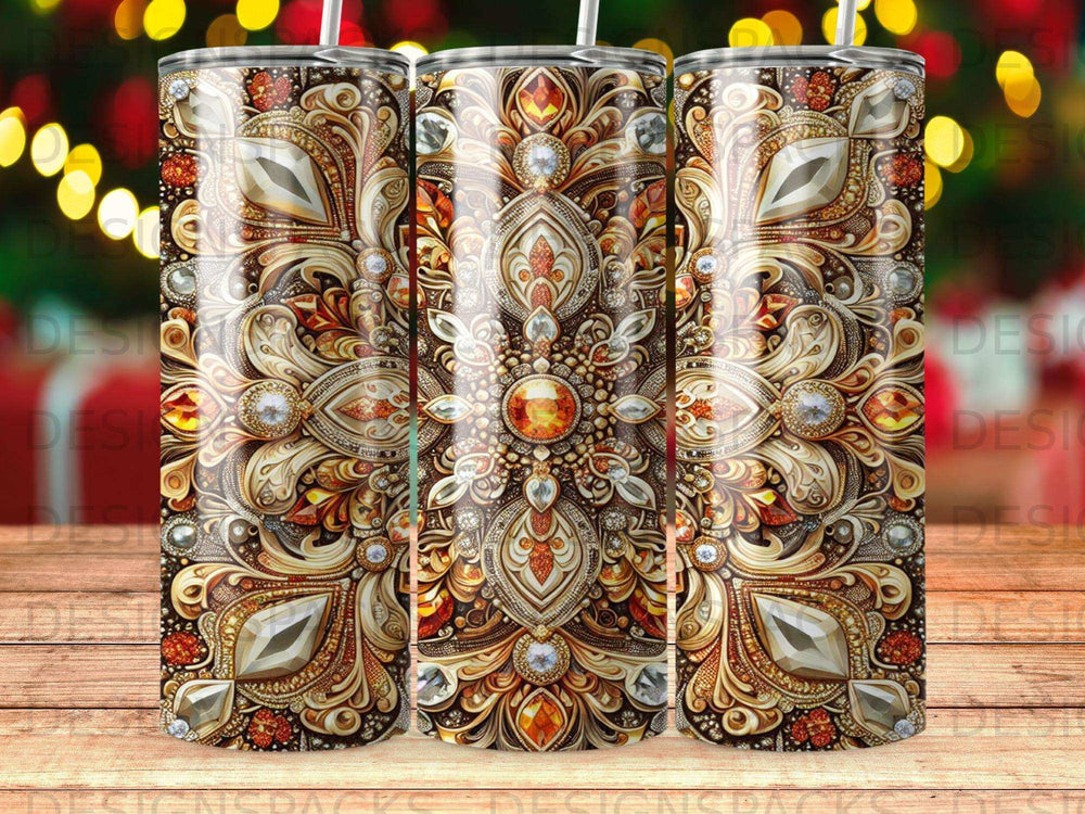 Ornate gold, jewel, and crystal patterned tumbler with bokeh background.