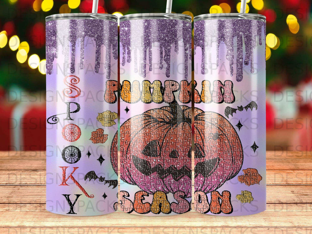 Glittering pumpkin face on a jigsaw puzzle tumbler with "Pumpkin Season" text.