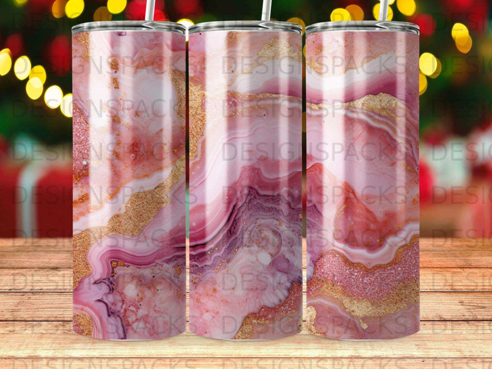 Three tumblers with pink marble and gold glitter design.
