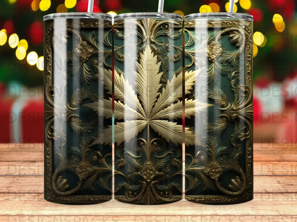 Green tumbler with ornate gold cannabis leaf and floral scrollwork.