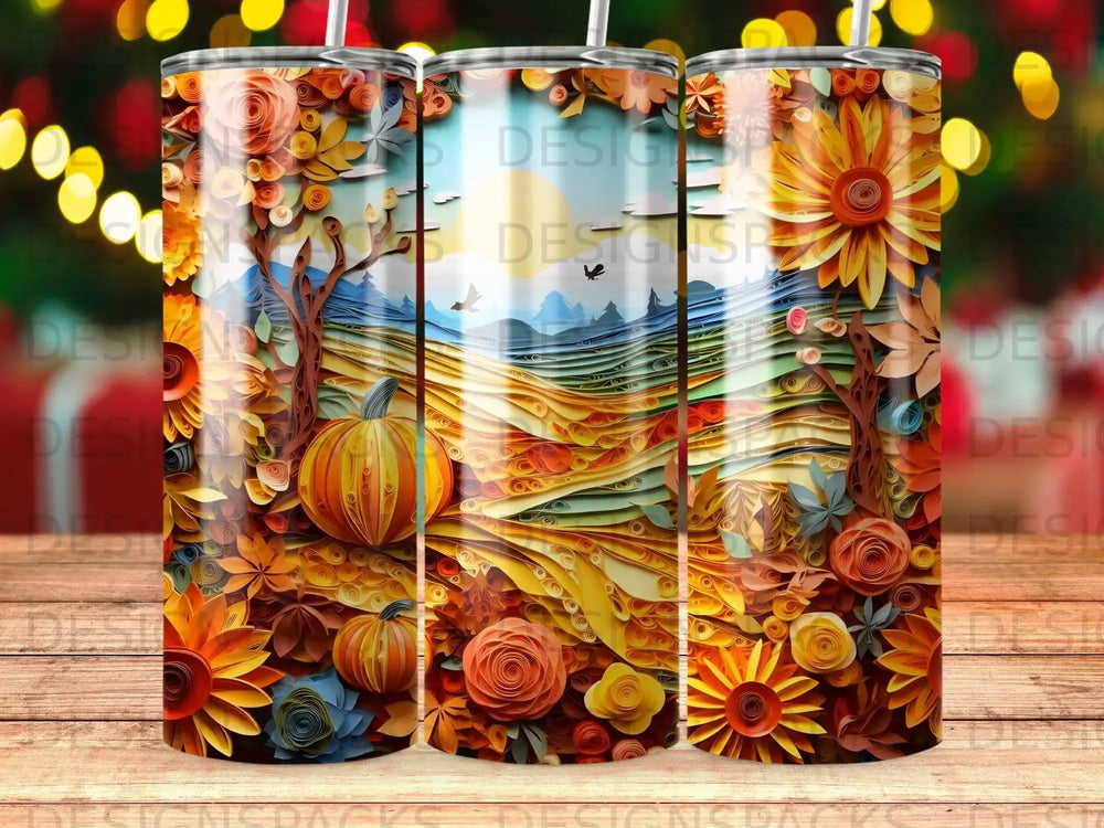 Autumn papercraft scene with pumpkins, flowers, and trees on a tumbler.