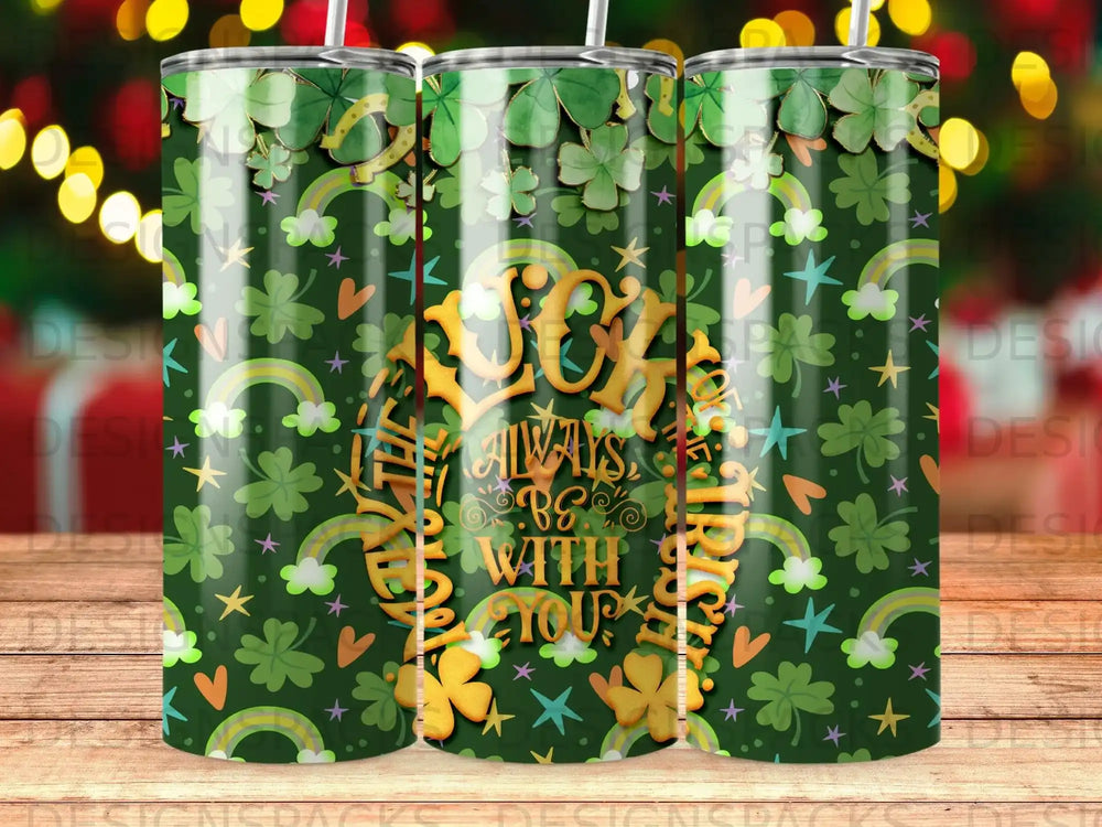 Green tumbler with "Joy all around" text, shamrocks, and rainbows.