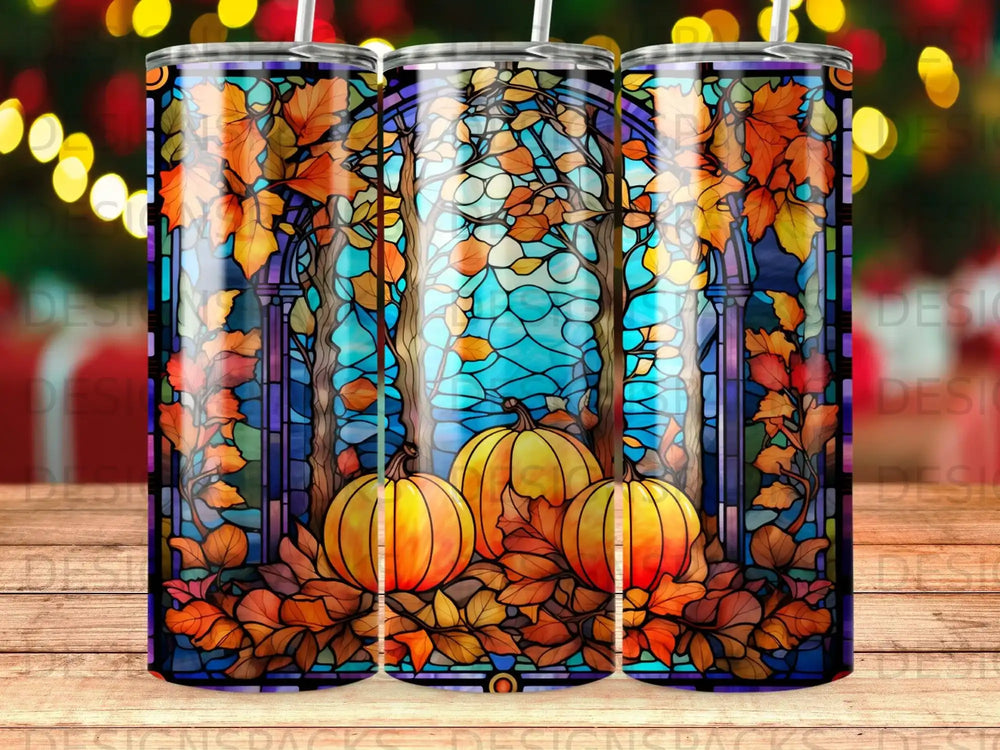 Stained glass art tumbler with pumpkins and fall leaves.