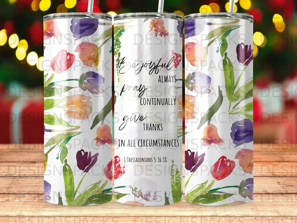 Tumbler with floral design and "pray continually give thanks" Bible verse.