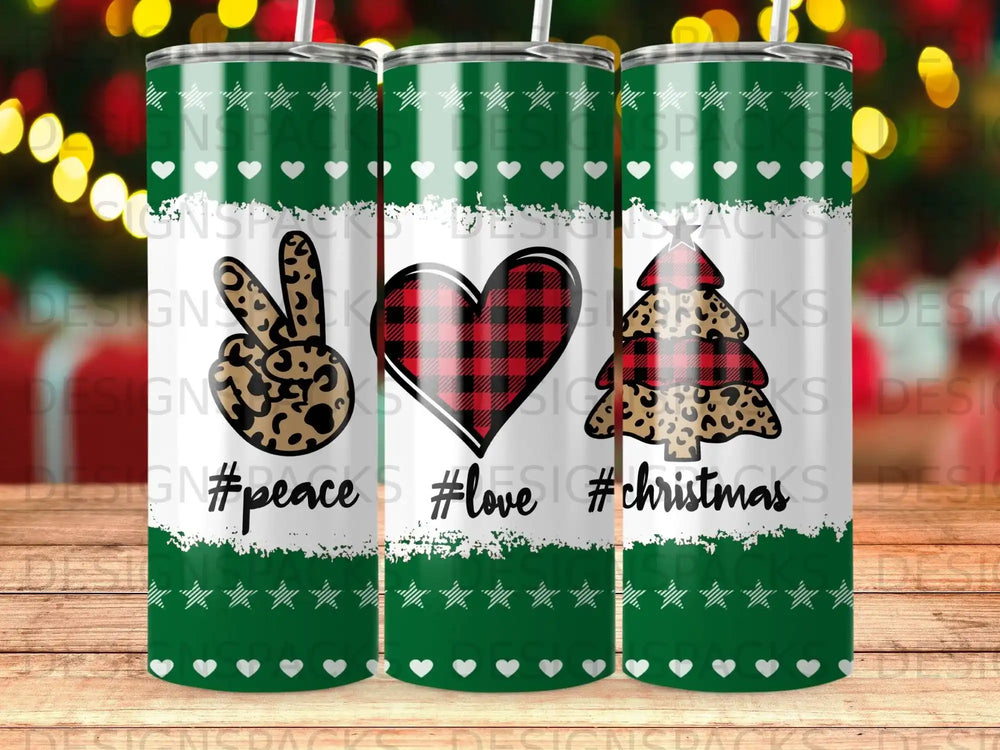 Three tumblers with peace, love, and Christmas designs.