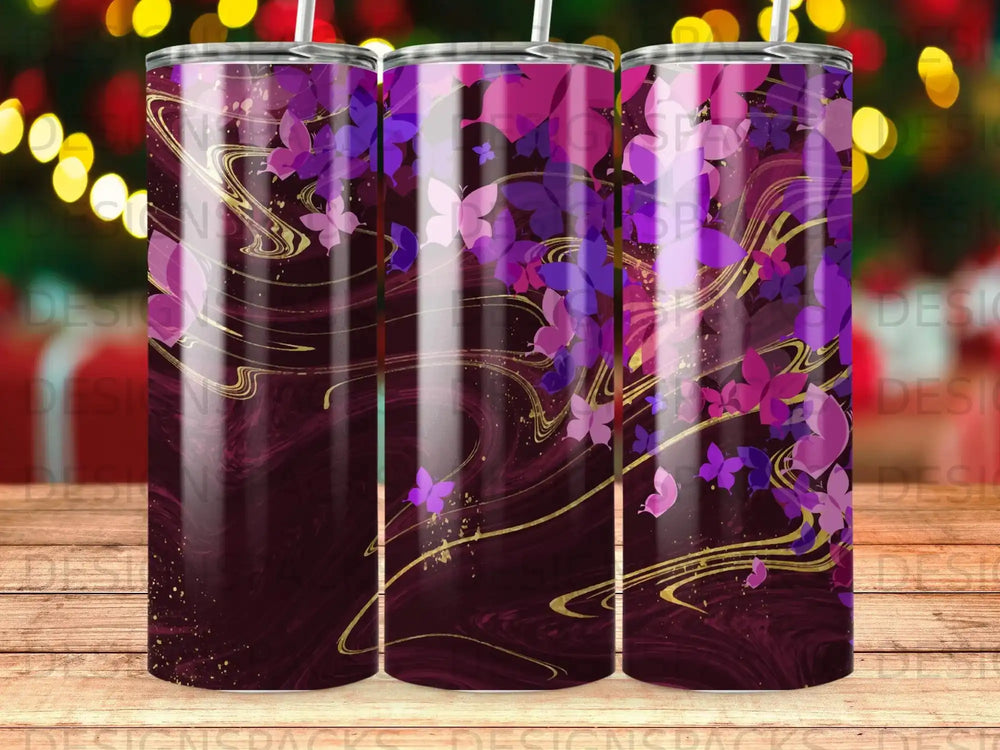 Tumbler with purple and pink butterfly design on dark marbled background.