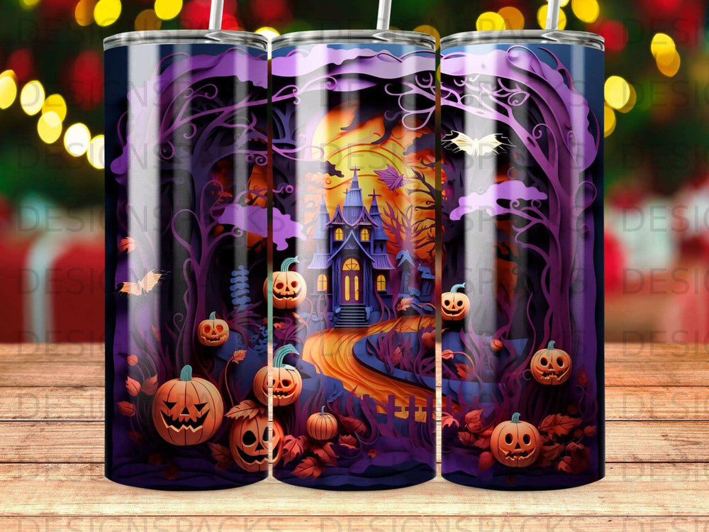 Halloween tumbler with spooky house, pumpkins, and moonlight.