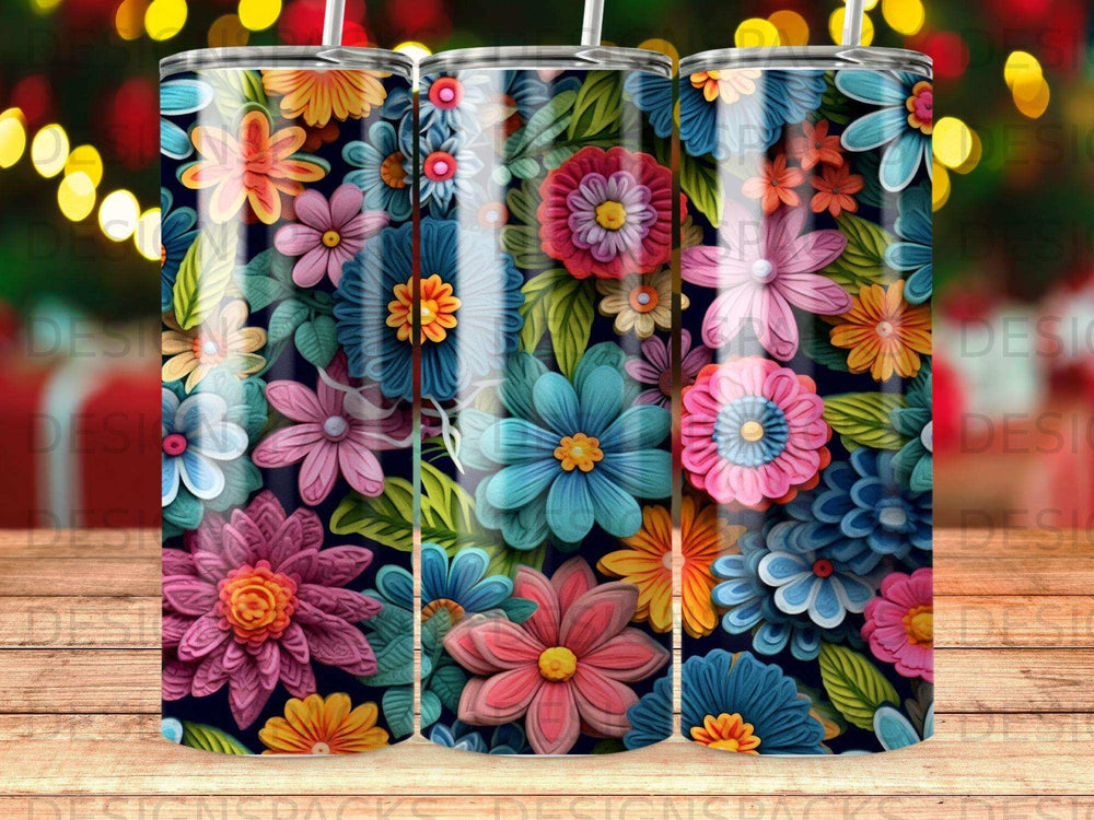 Dark tumbler with a vibrant, repeating pattern of colorful, dimensional flowers.