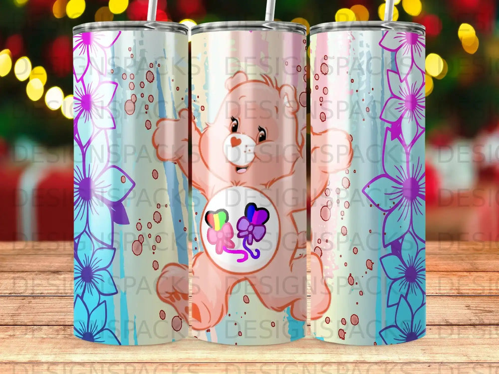 Care Bear with rainbow heart on pink tumbler with floral design.