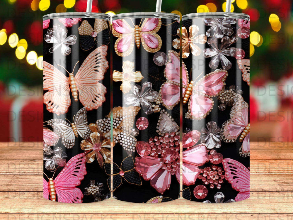 Pink, white, and clear glitter butterfly and flower patterns on a black tumbler.