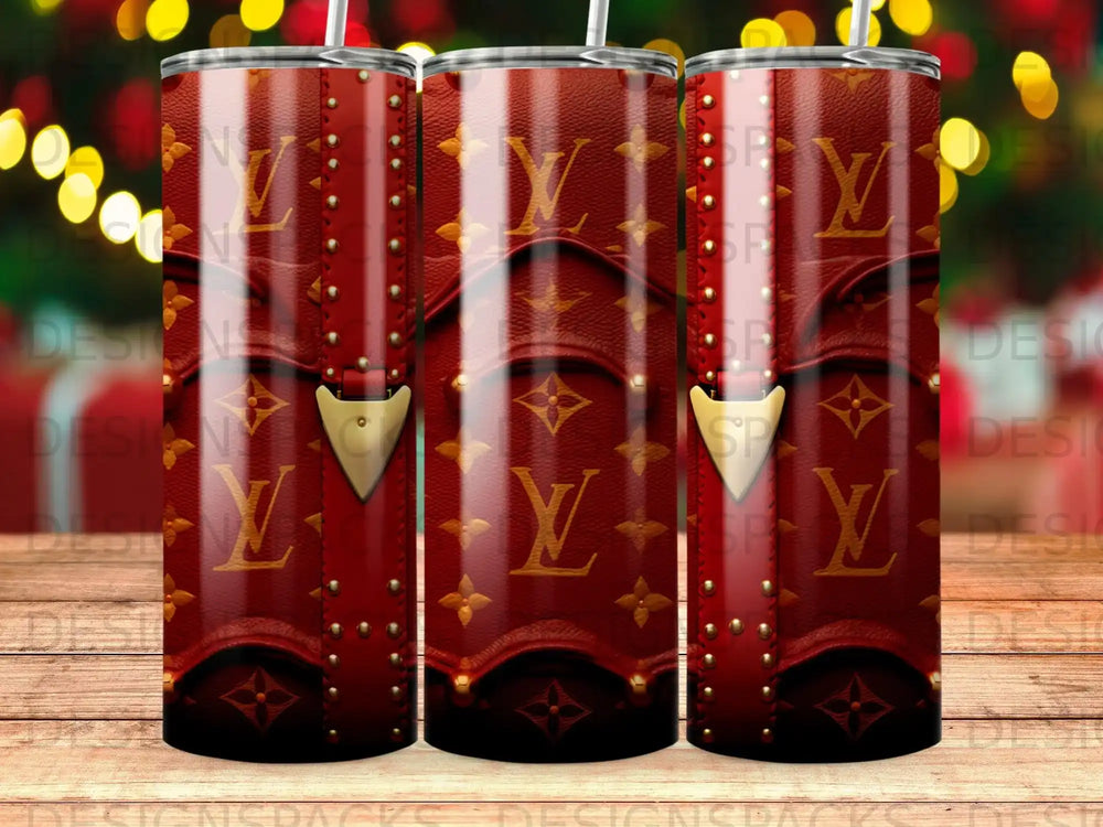 Red leather tumbler with gold LV monogram and gold stud details.