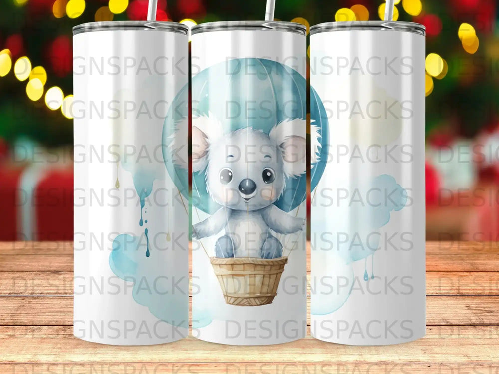 Koala in hot air balloon with clouds, "DESIGNSPACKS" watermark.