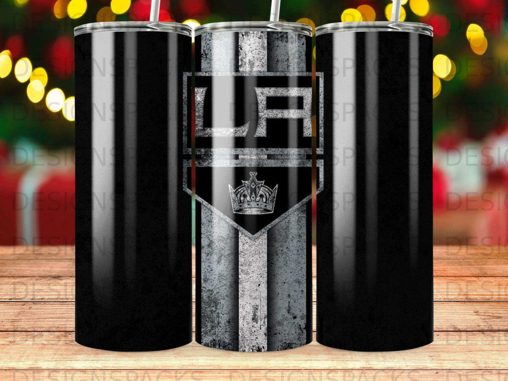 Los Angeles Kings logo on a black tumbler with metallic stripe design.
