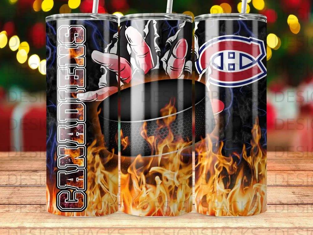 Montreal Canadiens logo and name on a tumbler with fiery background.