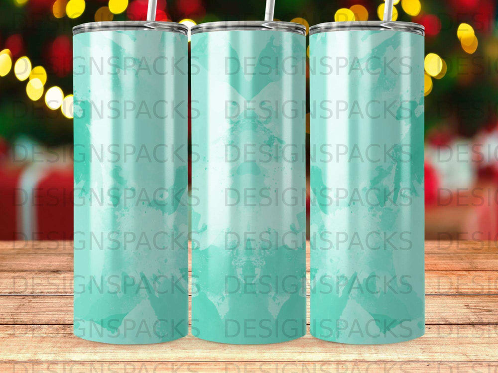 Three tumblers with a repeating "DESIGNSPACKS" logo and a teal gradient.