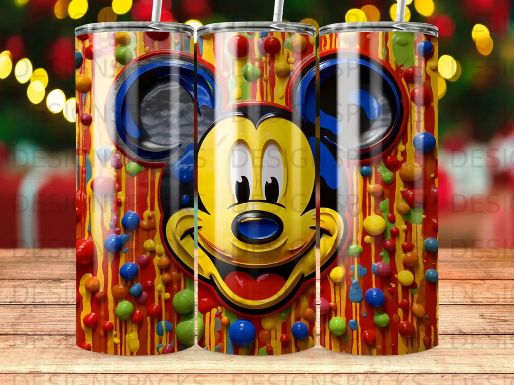 Mickey Mouse face with colorful paint splatters on a tumbler.