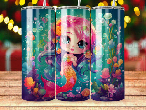 Pink mermaid with flowers and bubbles on a blue gradient tumbler.