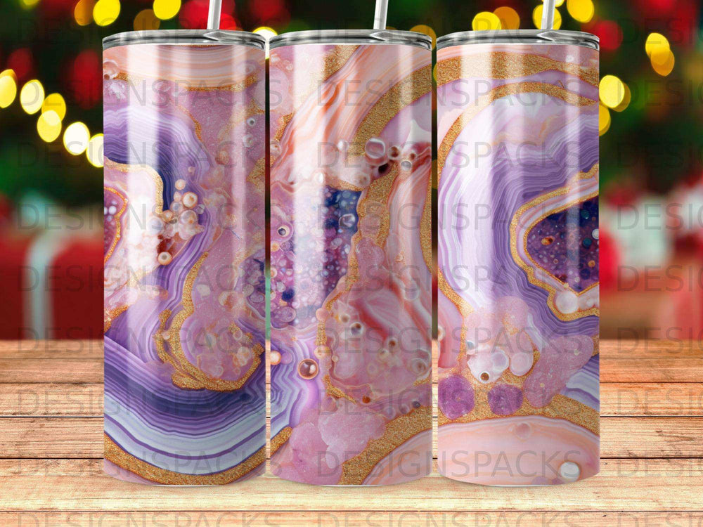 Three tumblers with marbled pink and purple designs, gold accents.