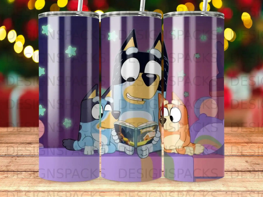 Bluey, Bingo, and Bandit reading a book on a purple couch.
