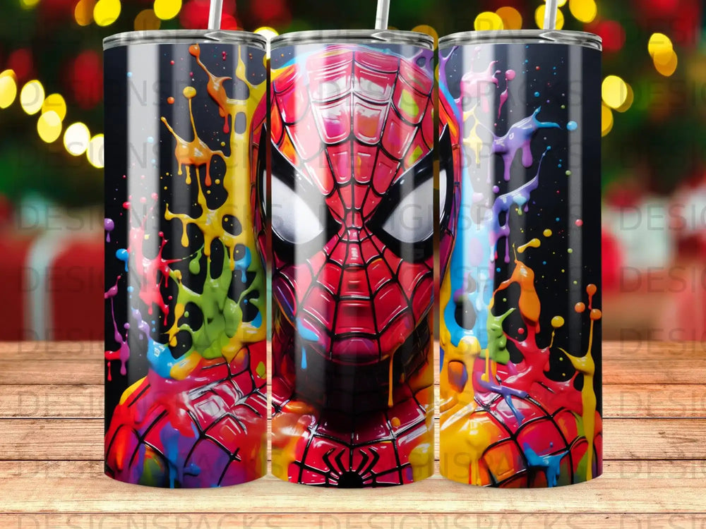 Spiderman face with colorful paint splatters on a tumbler.