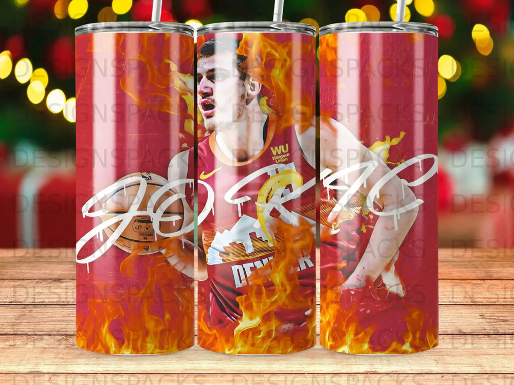 Basketball player Nikola Jokic on Denver Nuggets tumbler with flames.