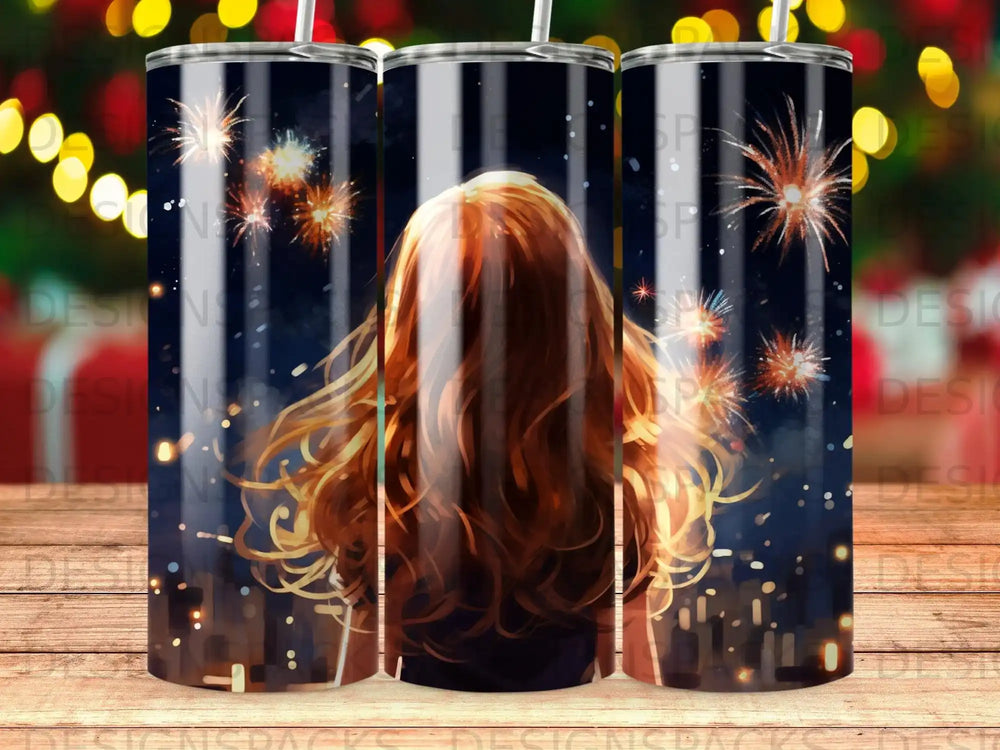 Woman with flowing hair watches fireworks over a city at night.