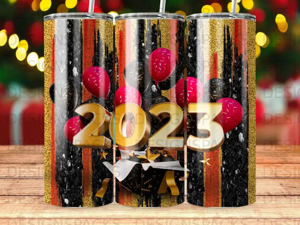 2023 balloons and gift box design on a striped tumbler.