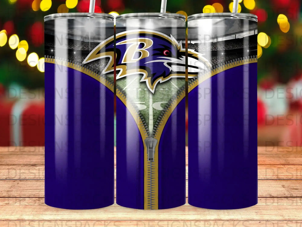 Baltimore Ravens logo on a purple and gold zipper-patterned tumbler.