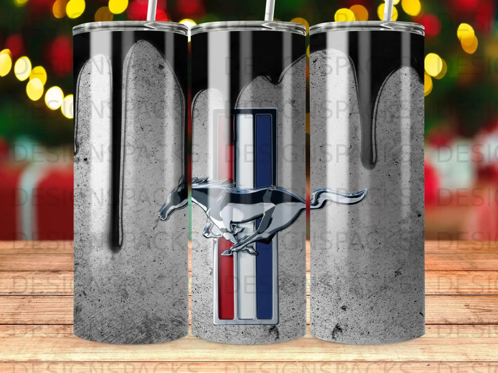 Silver Mustang emblem on concrete texture tumbler with dripping paint.