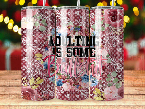 Tumbler with floral pattern and text 