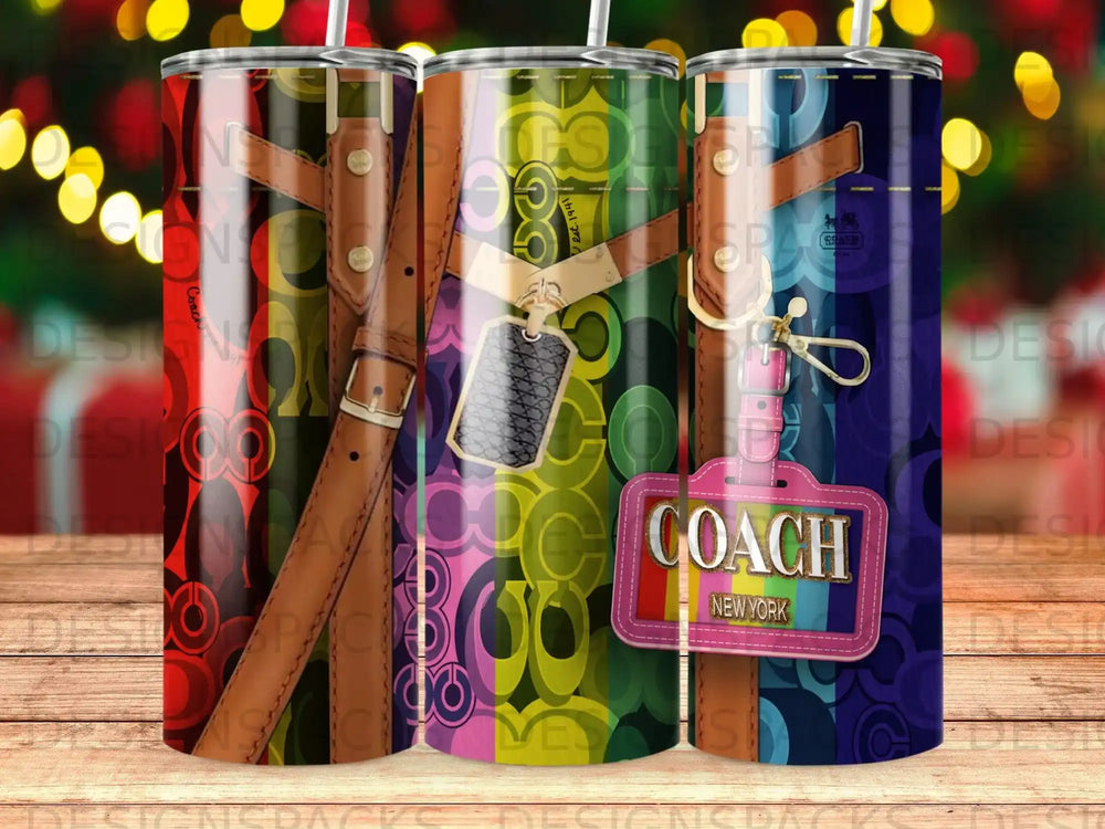 Coach logo pattern on a tumbler with a luggage tag and strap.
