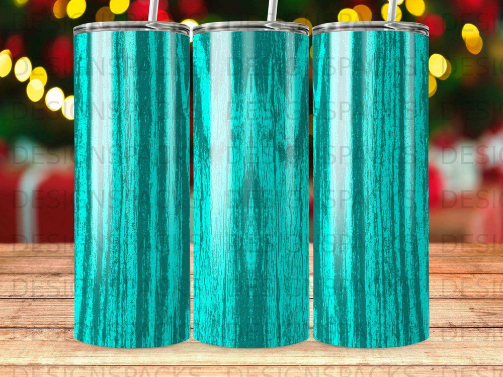 Three teal wooden textured tumblers arranged in a row.