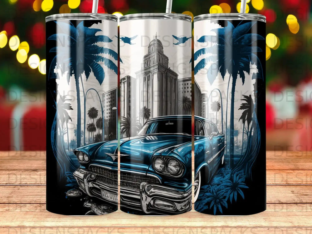 Blue vintage car parked on city street with palm trees and buildings.