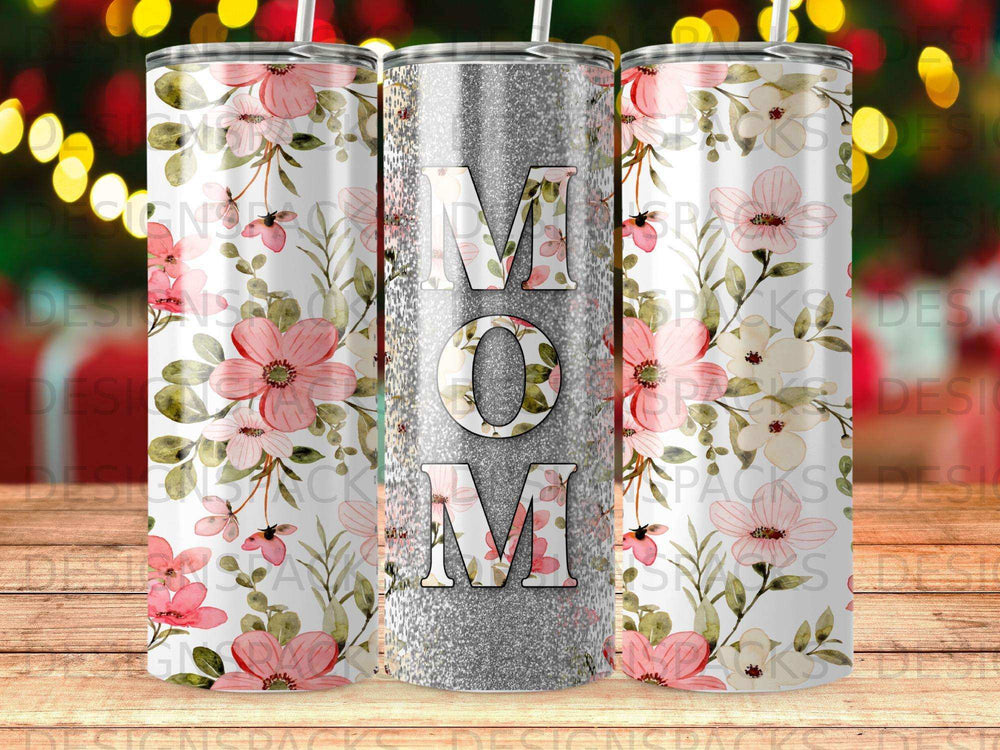 Tumbler with floral pattern and "Mom" in glitter letters.