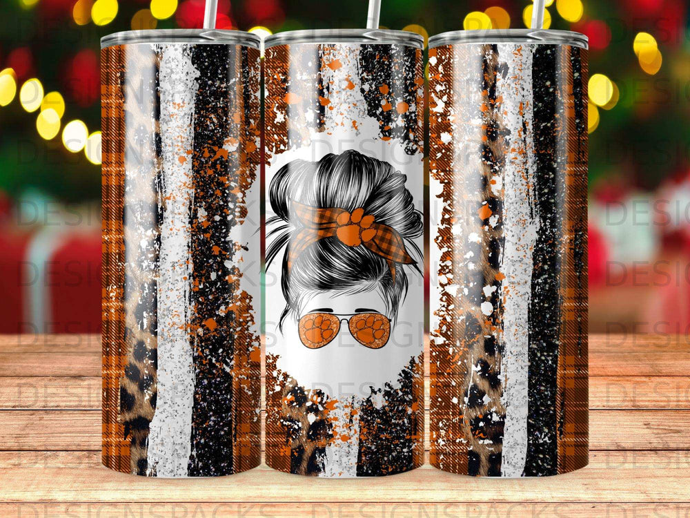 Tumbler with messy bun woman, leopard print, and plaid pattern.