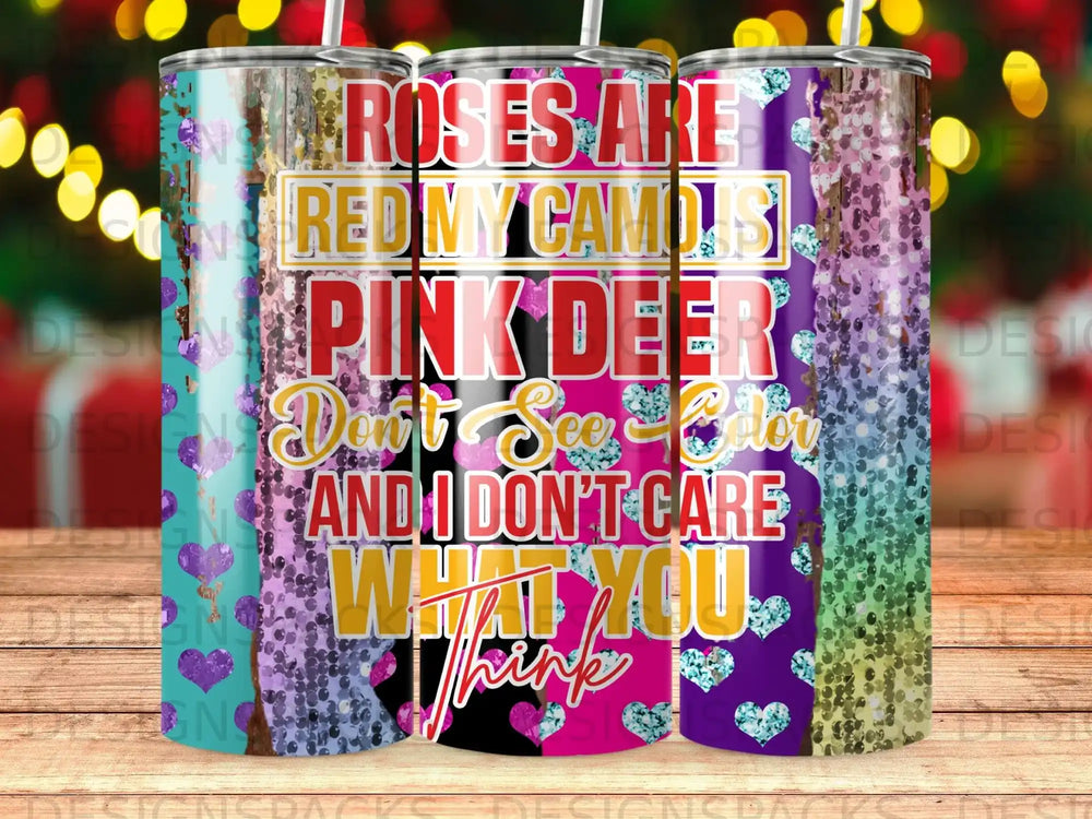 Tumbler with roses, deer, and glitter design, reading "Roses are red, my camo is pink".