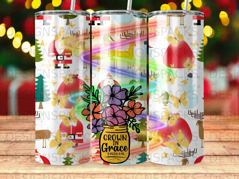 Tumbler with colorful Christmas graphics and a mason jar with flowers.