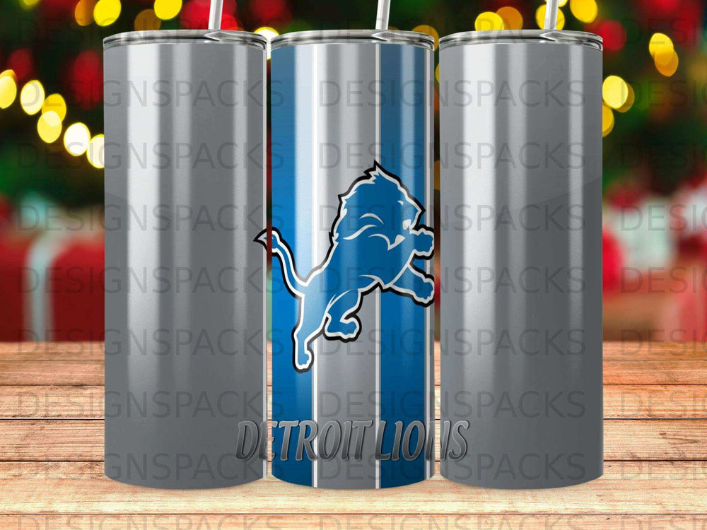 Detroit Lions logo on a silver tumbler with repeated "DESIGNSPACKS" watermark.