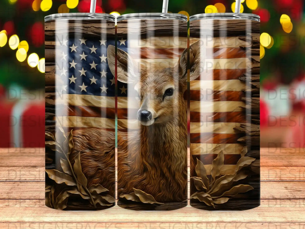 American flag and deer art on a cylindrical tumbler.