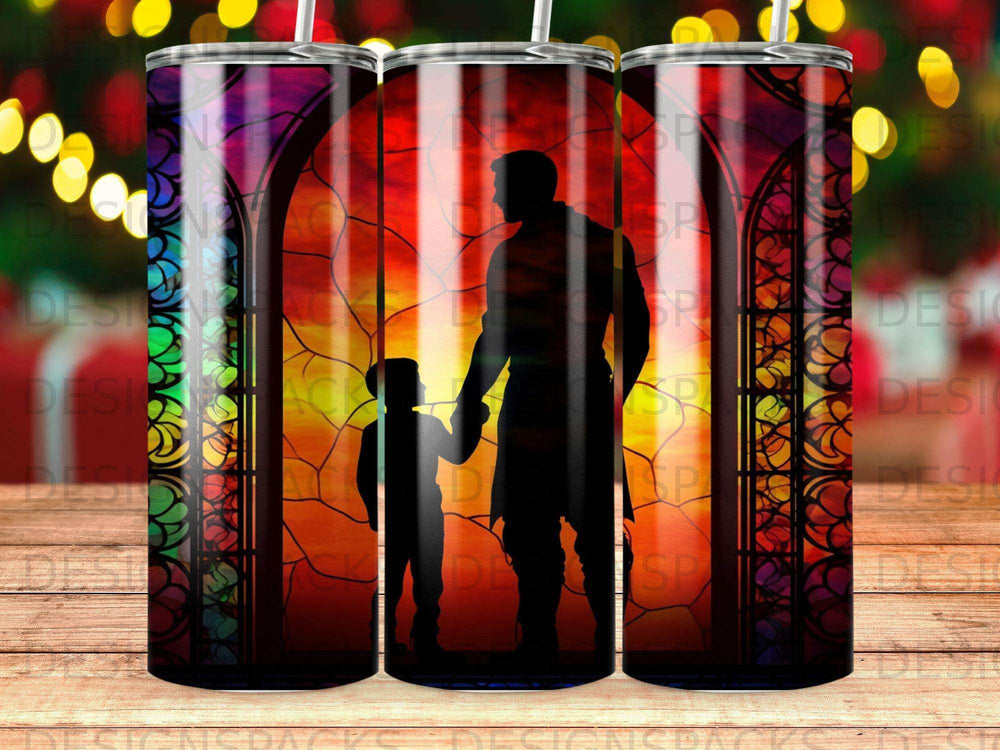 Silhouette of father and son holding hands against stained glass window.
