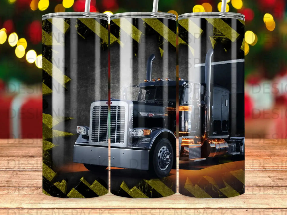 Black semi-truck with yellow and black hazard stripes pattern.