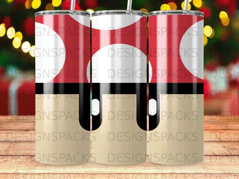 Mushroom-themed tumbler with straw and repeating "DESIGNSPACKS" text pattern.