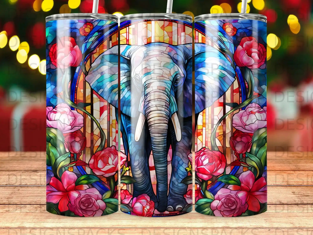 Stained glass elephant surrounded by vibrant pink and red roses, on a tumbler.